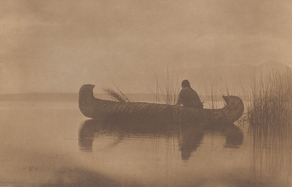 EDWARD S. CURTIS (1868-1952) Kutenai Duck Hunter, plate 249 from The North American Indian.